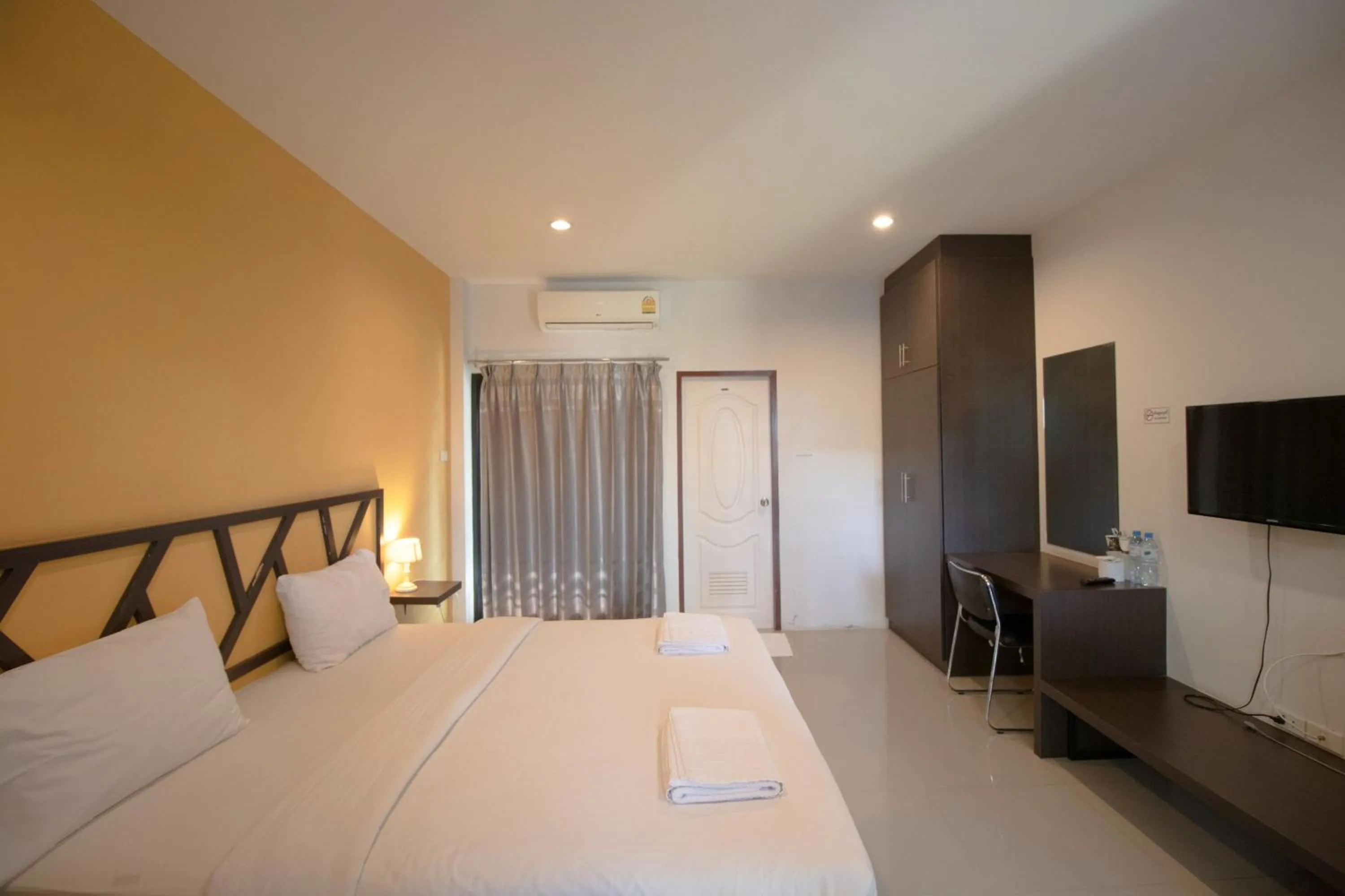 Bedroom in Somsamai Style Apartment