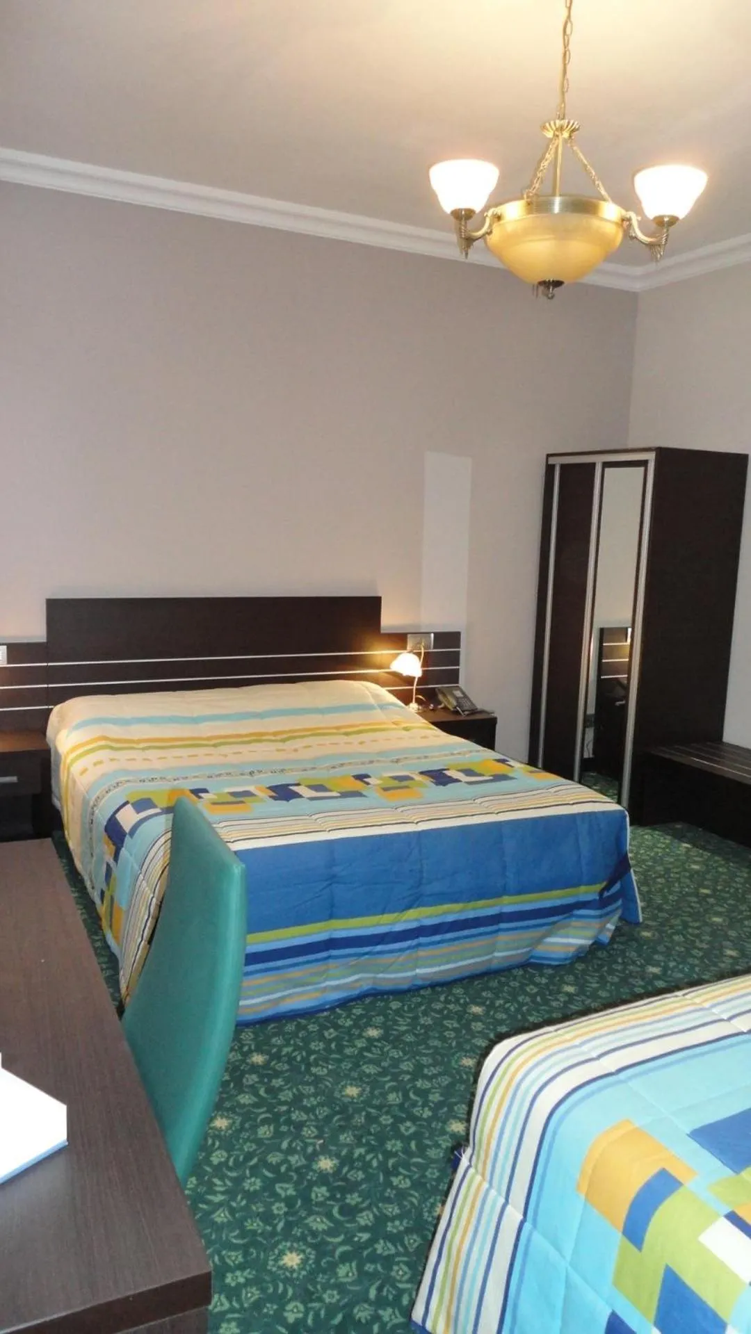 Bed in Hotel L'auberge Du Souverain