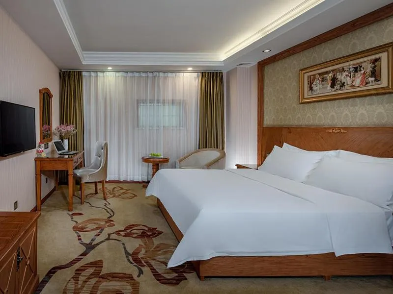 Bed in Vienna Hotel Huizhou Chenjiang Avenue