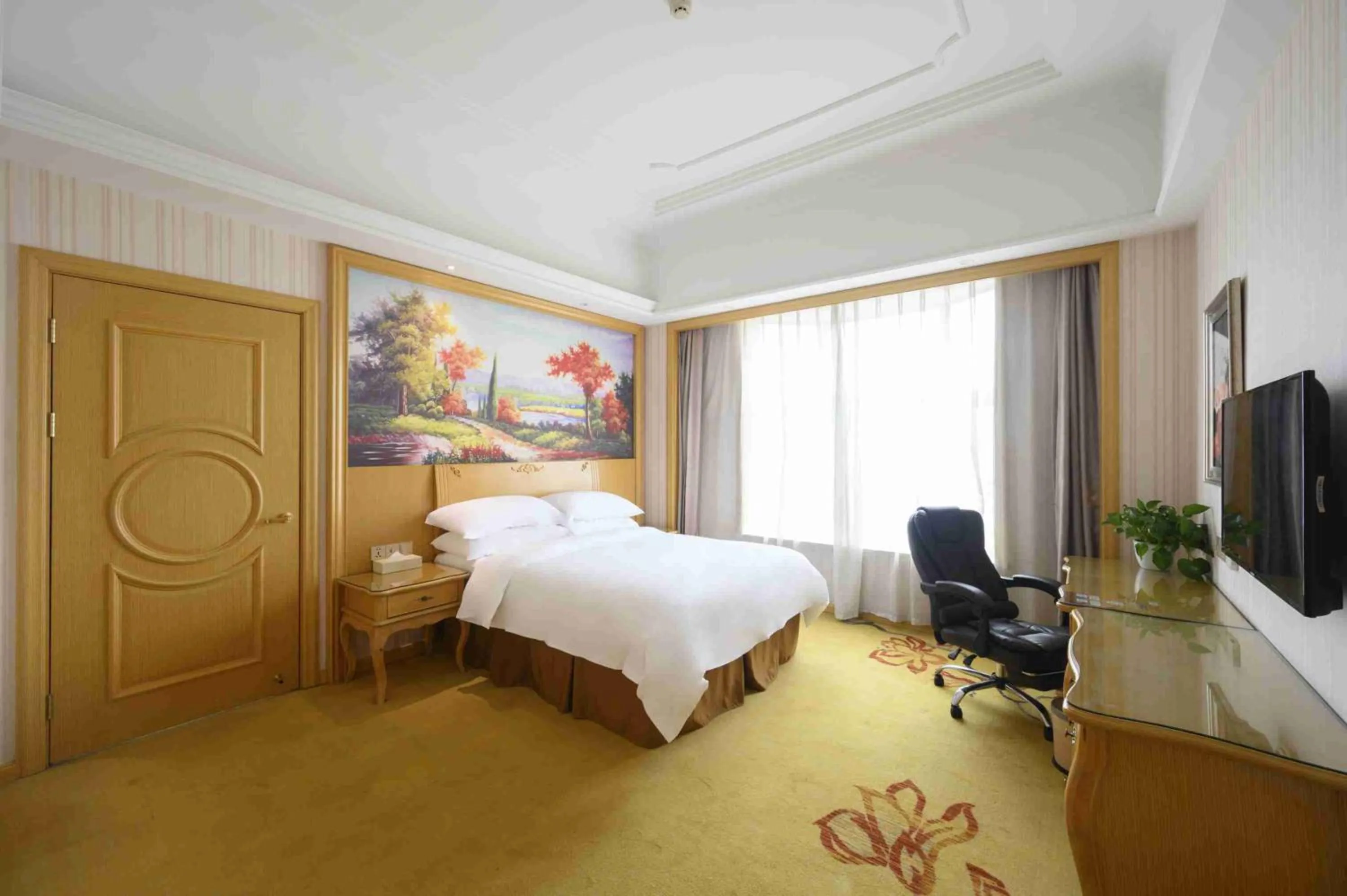 Bed in Vienna International Hotel Shanghai Malu Station