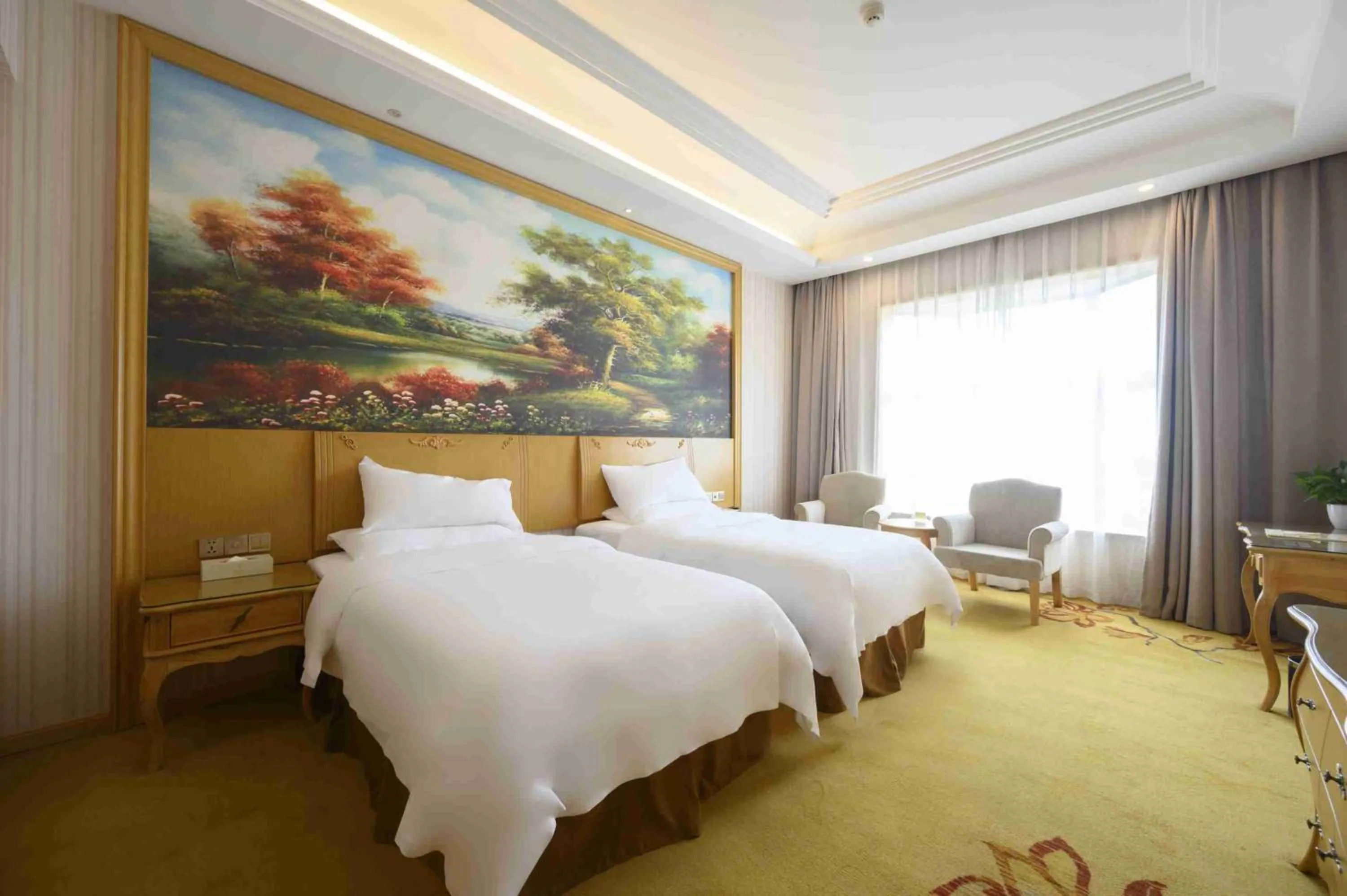 Bed in Vienna International Hotel Shanghai Malu Station