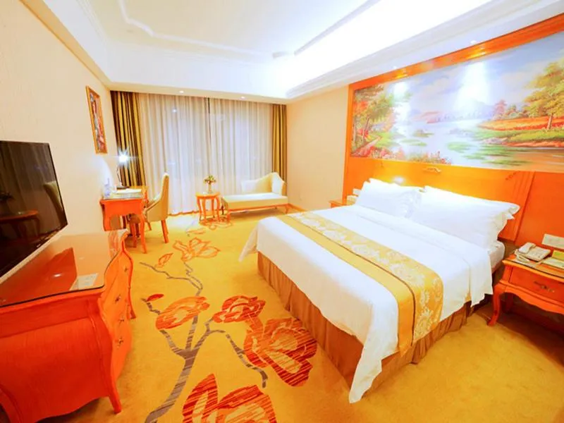 Bed in Vienna Hotel Shaoguan Wuli Pavilion