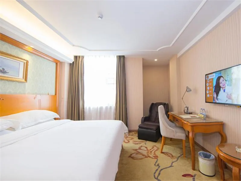 Bed in Vienna Hotel Guangzhou Nanpu Station