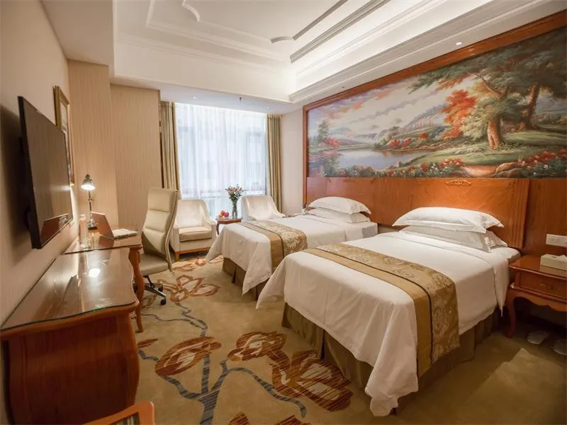 Bed in Vienna International Hotel Xi'an Hancheng Lake