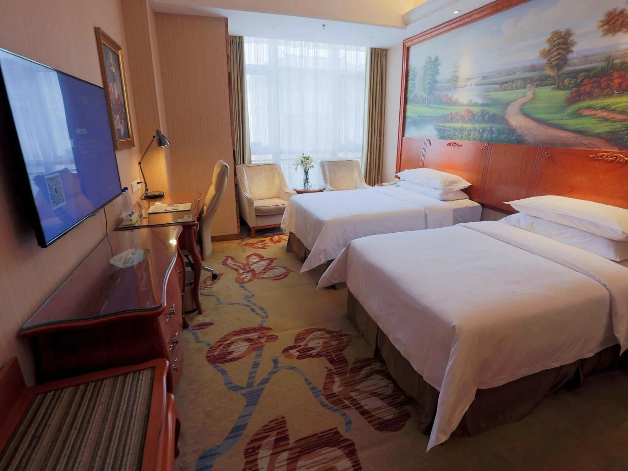 Bed in Vienna International Hotel Xi'an Hancheng Lake