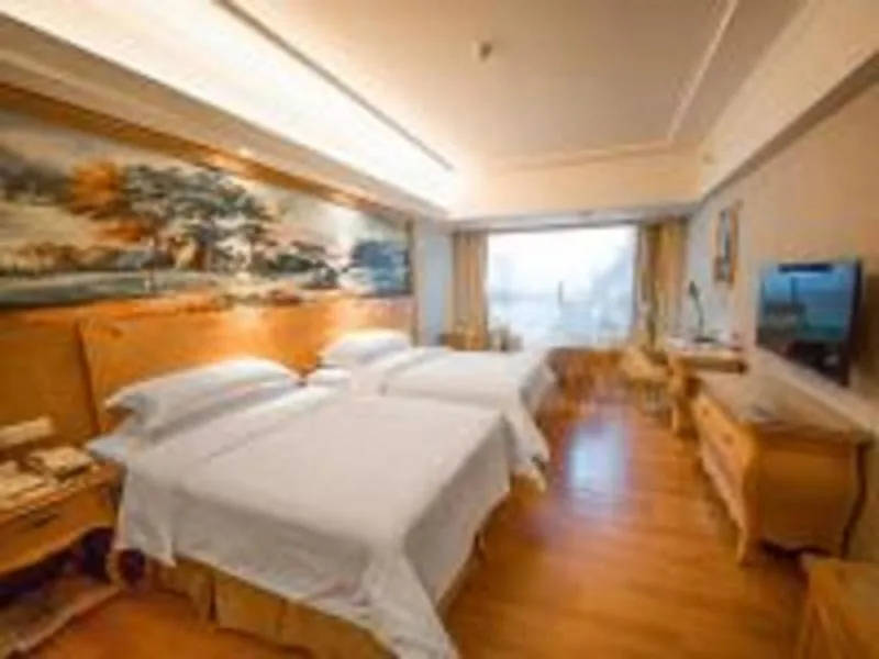 Bed in Vienna Hotel Foshan Airport