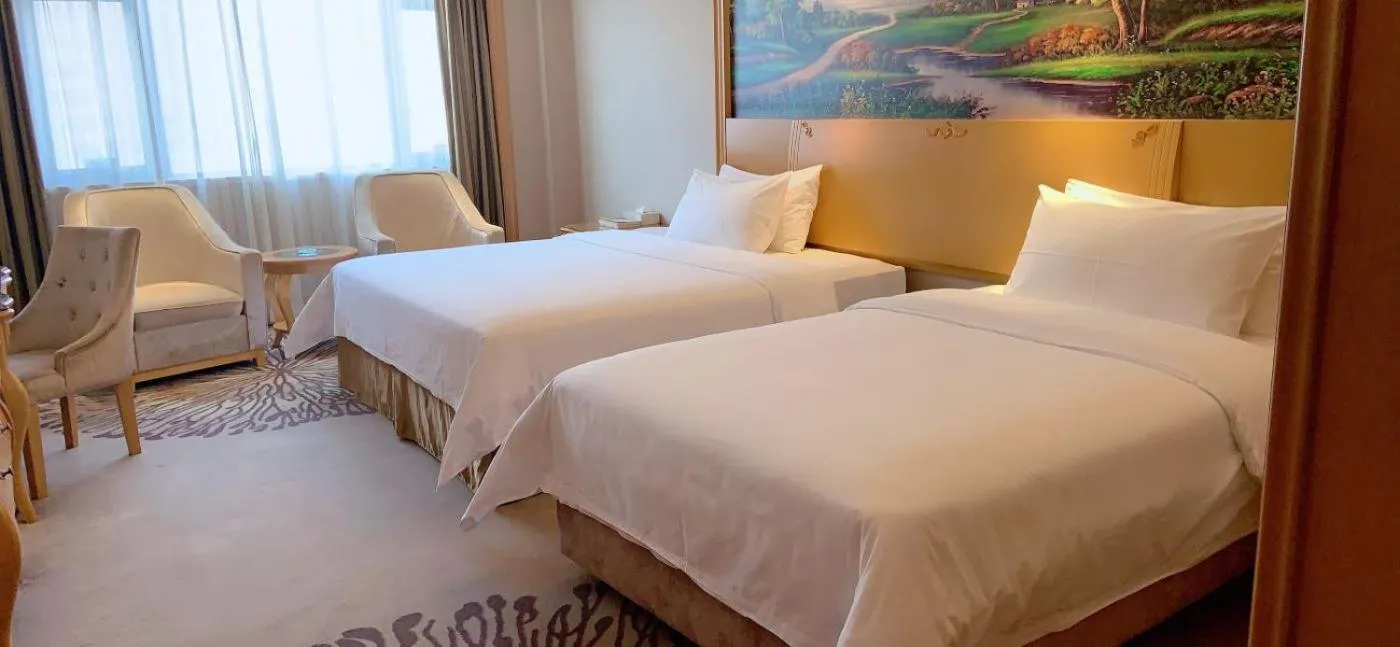Bed in Vienna Hotel Foshan Airport