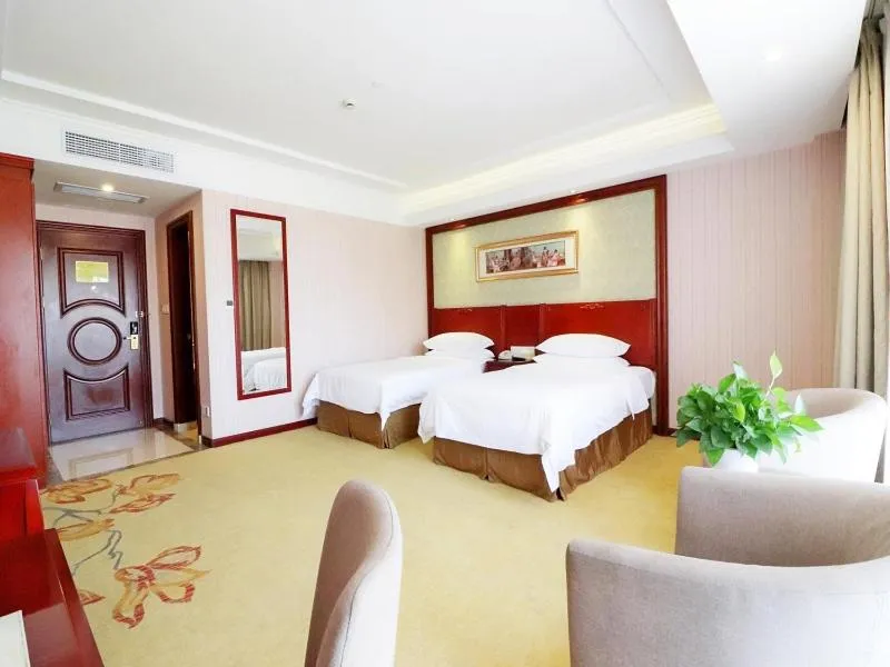 Bed in Vienna Hotel Shanghai Hongqiao National Convention Centre