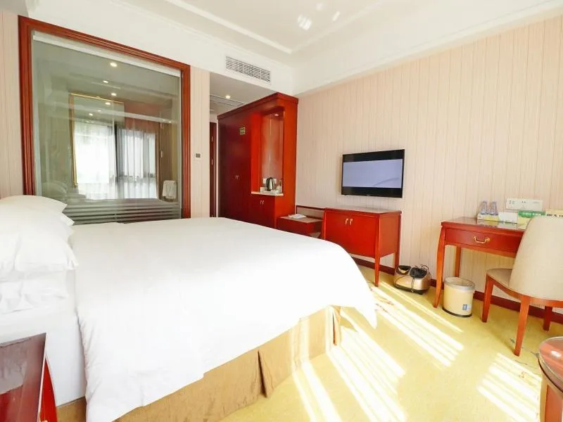 Bed in Vienna Hotel Shanghai Hongqiao National Convention Centre