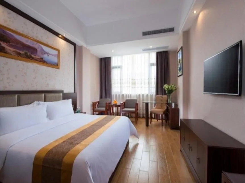 Bed in Vienna International Hotel Jieyang Chaoshan Airport