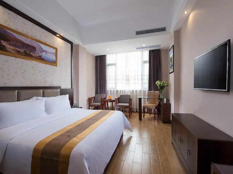 Bed in Vienna International Hotel Jieyang Chaoshan Airport