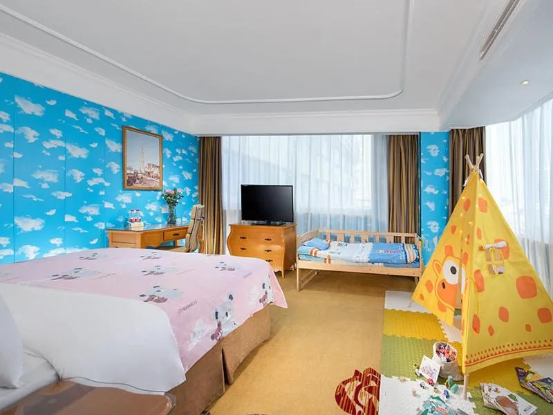 Bed in Vienna International Hotel Zhuhai Golden Phoenix