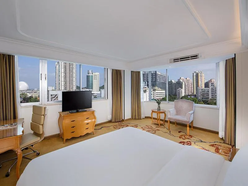 Bed in Vienna International Hotel Zhuhai Golden Phoenix