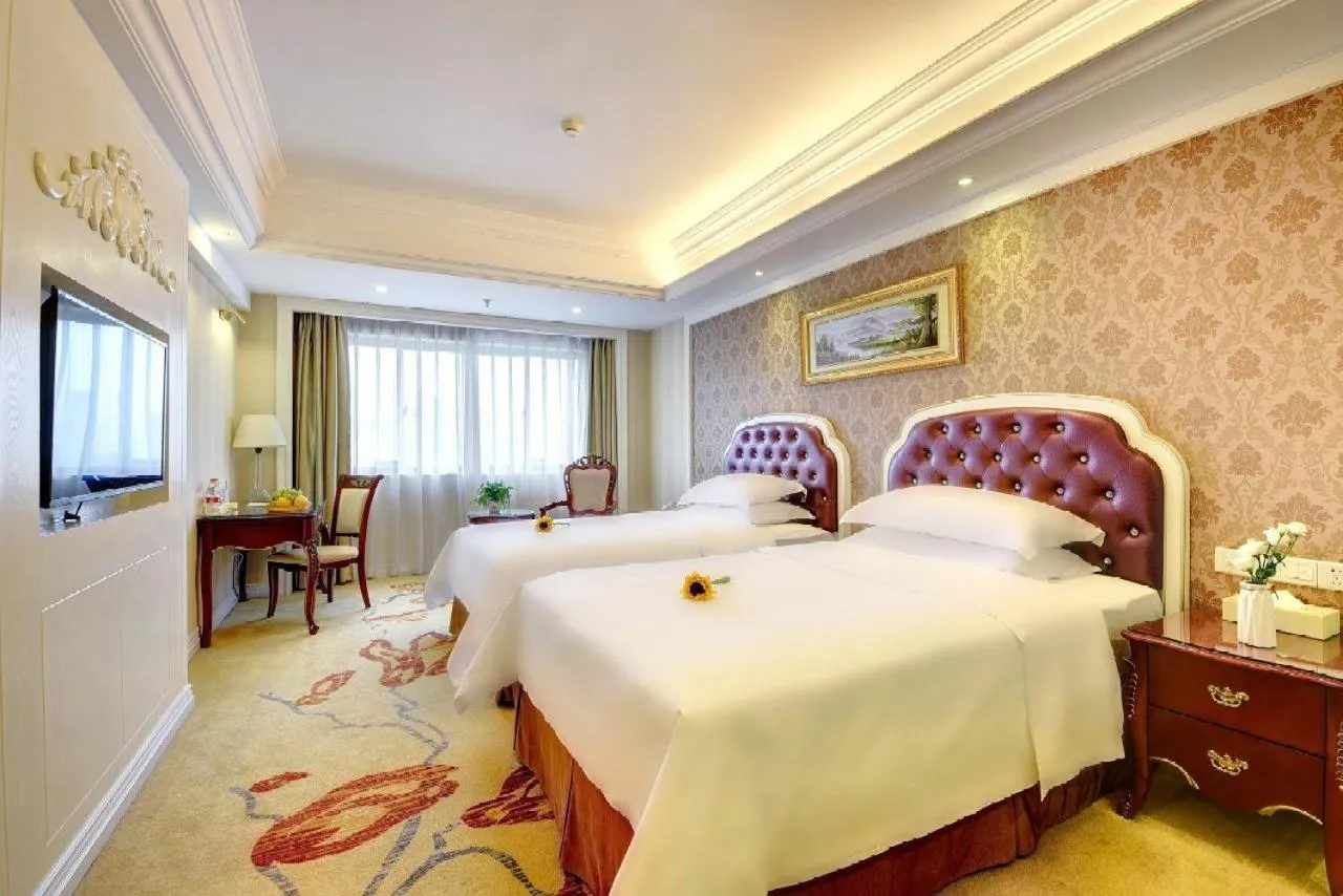 Bed in Vienna International Hotel Nanning Zoo