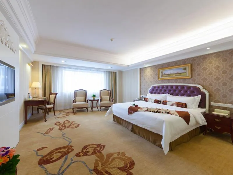 Bed in Vienna International Hotel Nanning Zoo