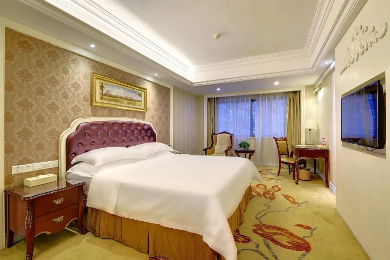 Bed in Vienna International Hotel Nanning Zoo