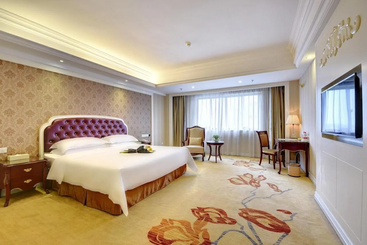Bed in Vienna International Hotel Nanning Zoo