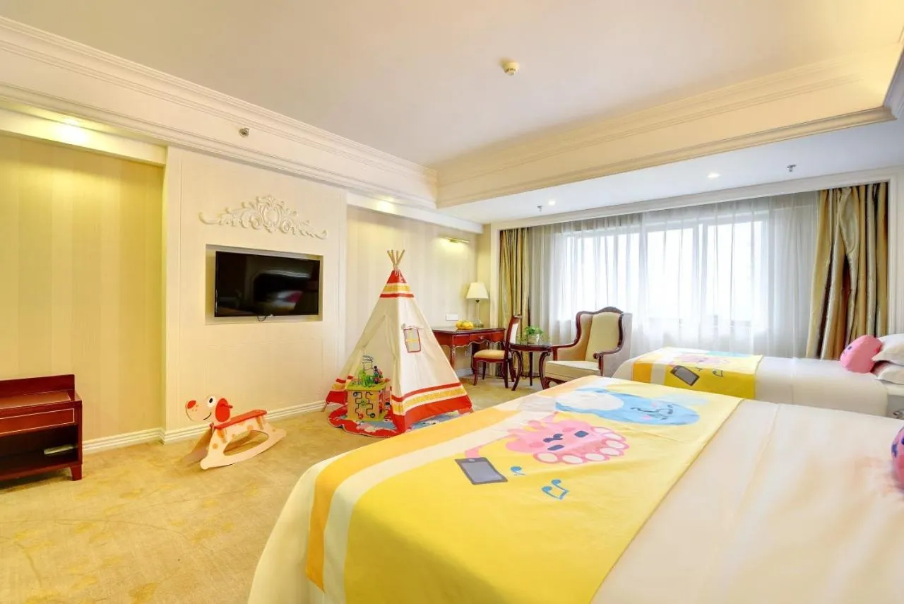 Bed in Vienna International Hotel Nanning Zoo