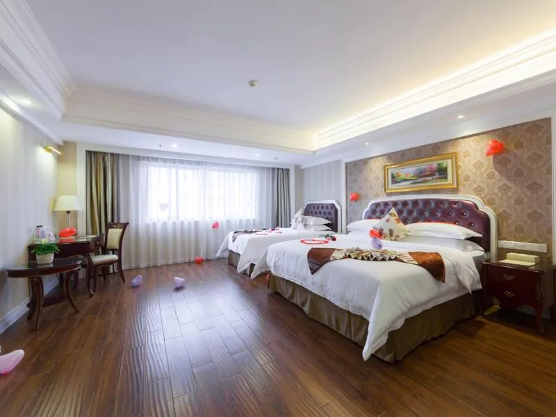 Bed in Vienna International Hotel Nanning Zoo