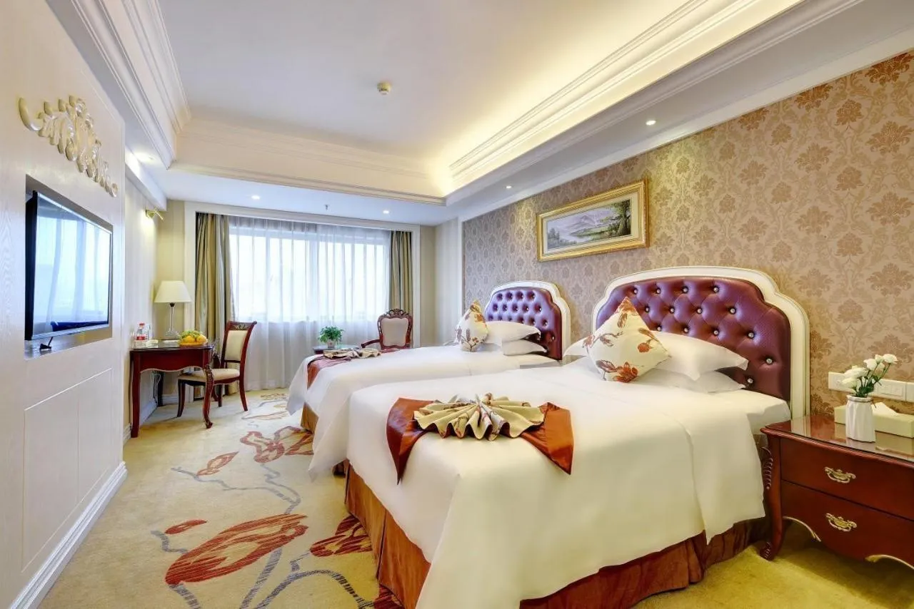 Bed in Vienna International Hotel Nanning Zoo