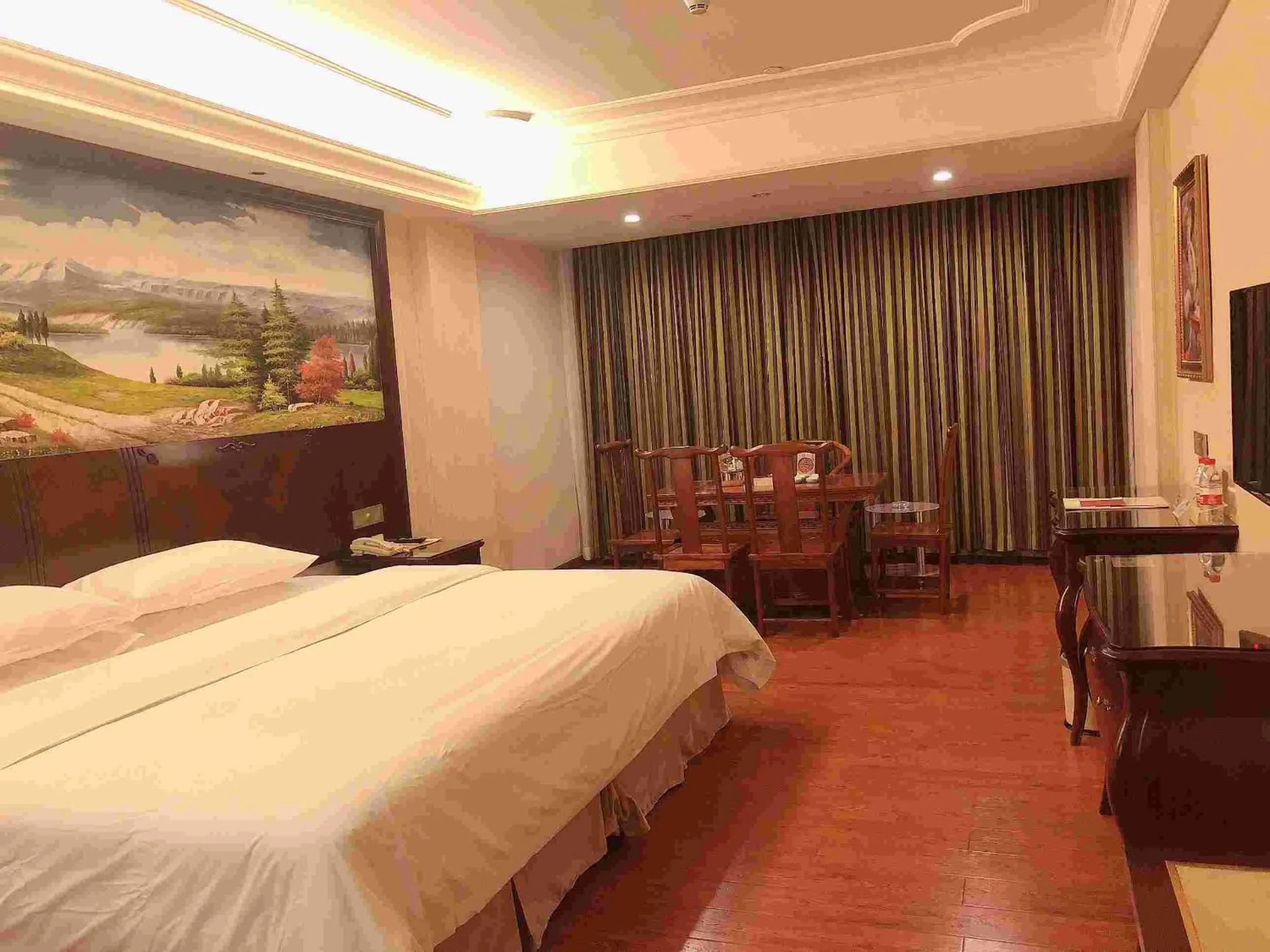 Bed in Vienna Hotel Guangzhou Shiling