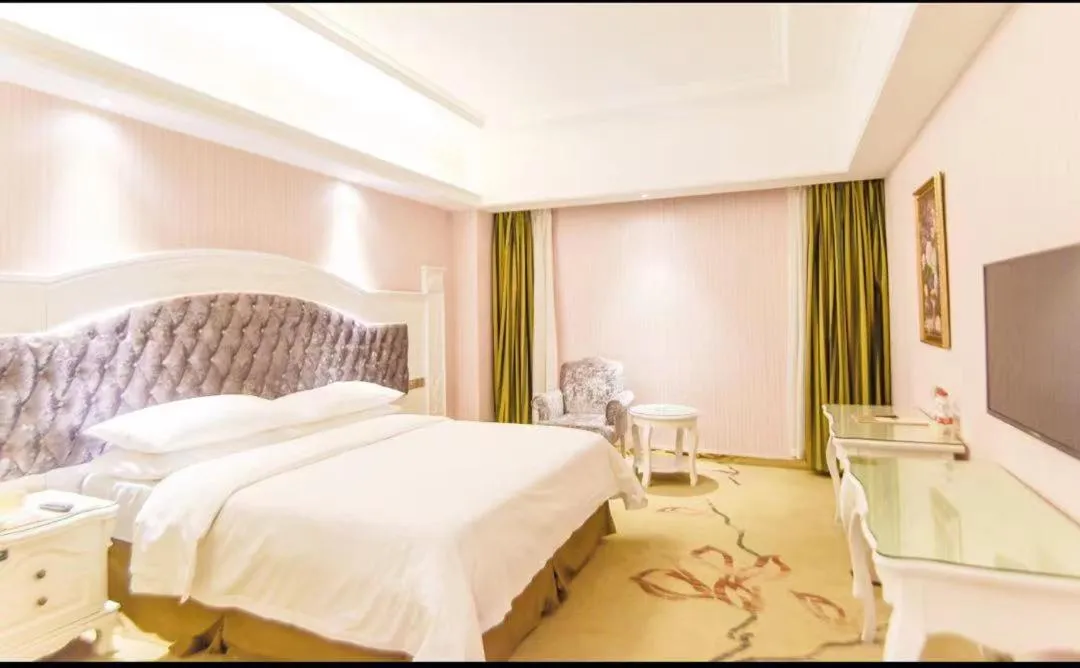 Bed in Vienna International Hotel Guilin Wanda Plaza