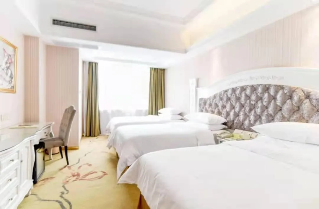 Bed in Vienna International Hotel Guilin Wanda Plaza