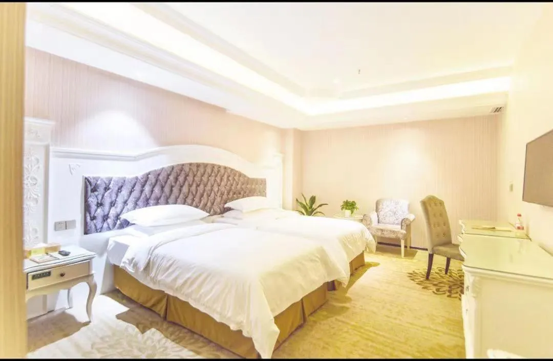 Bed in Vienna International Hotel Guilin Wanda Plaza