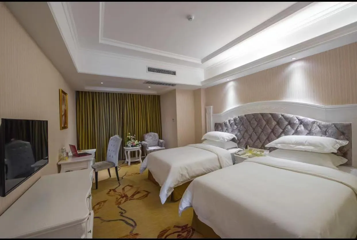 Bed in Vienna International Hotel Guilin Wanda Plaza