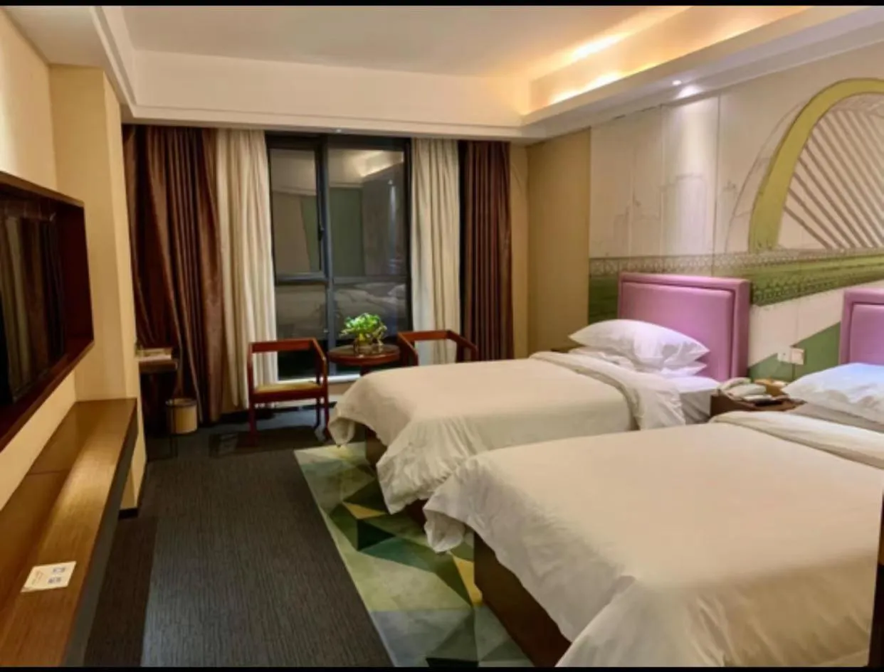 Bed in Vienna International Hotel Guilin Wanda Plaza