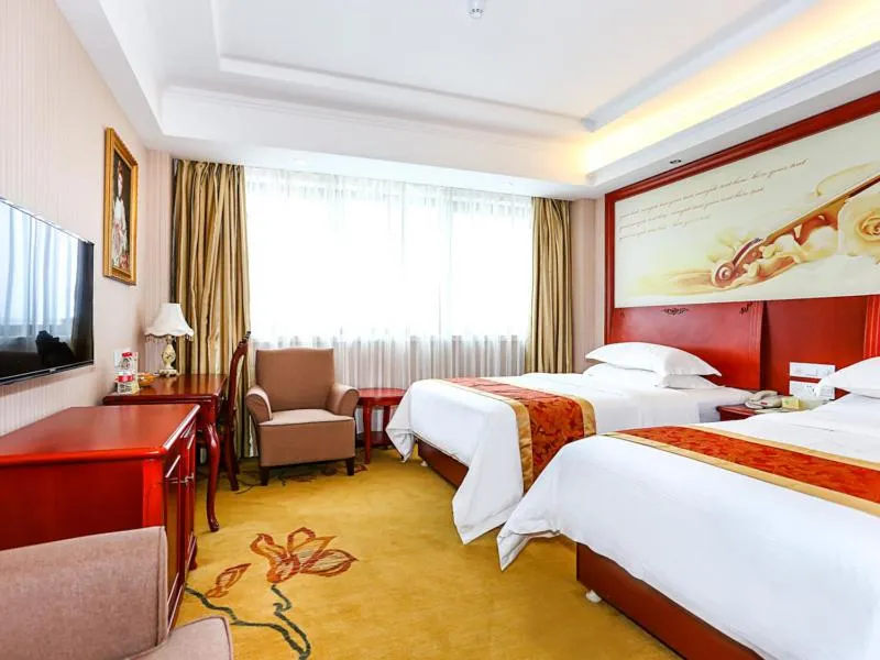 Bed in Vienna International Hotel Shanghai Fengxian Nanqiao