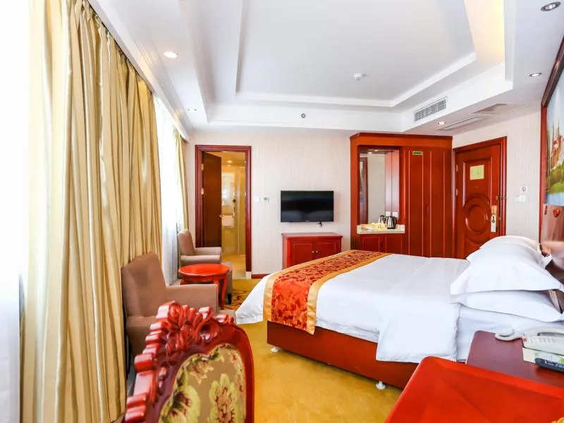 Bed in Vienna International Hotel Shanghai Fengxian Nanqiao