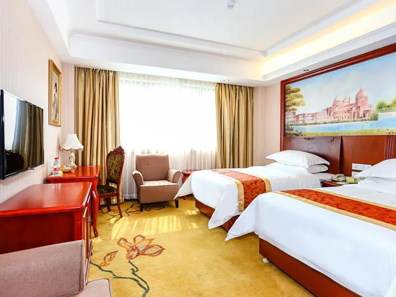 Bed in Vienna International Hotel Shanghai Fengxian Nanqiao