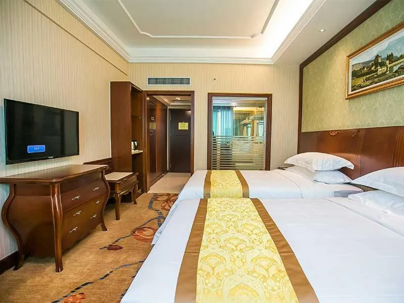 Bed in Vienna Hotel Nanjing Longjiang