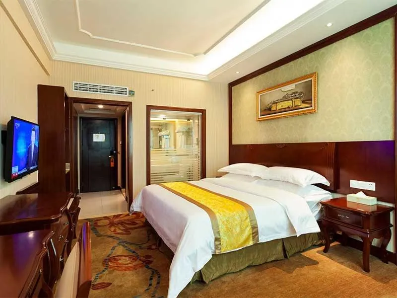 Bed in Vienna Hotel Nanjing Longjiang