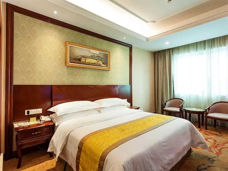 Bed in Vienna Hotel Nanjing Longjiang