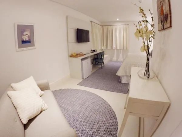 Living room, Bed in Hotel Maui Maresias