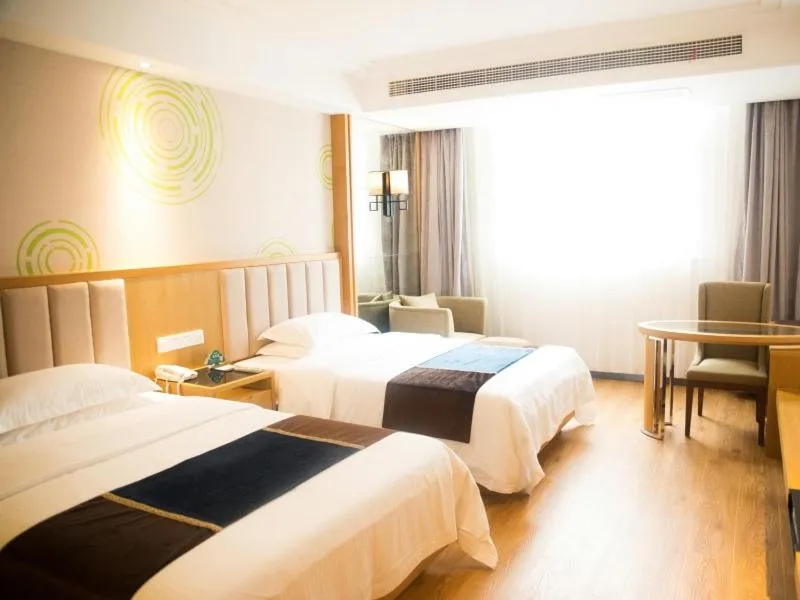 Bed in GreenTree Inn JiangSu Taizhou Taixing Middle Guoqing Road Business Hotel