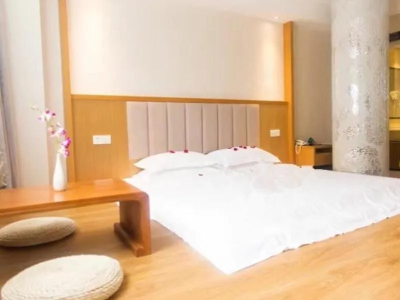 Bed in GreenTree Inn JiangSu Taizhou Taixing Middle Guoqing Road Business Hotel