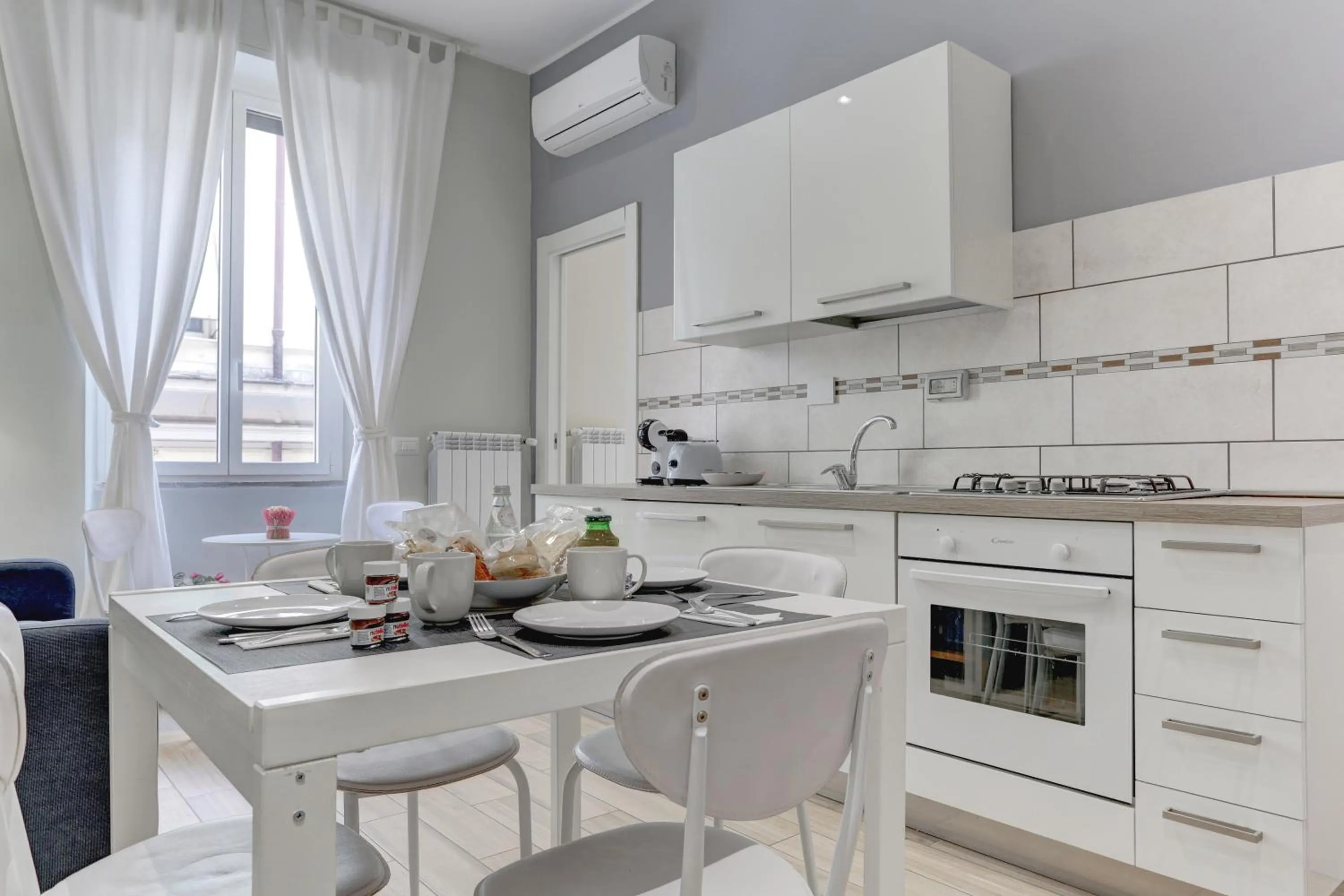 Kitchen or kitchenette in Appartamento Santi Quattro - Colosseo