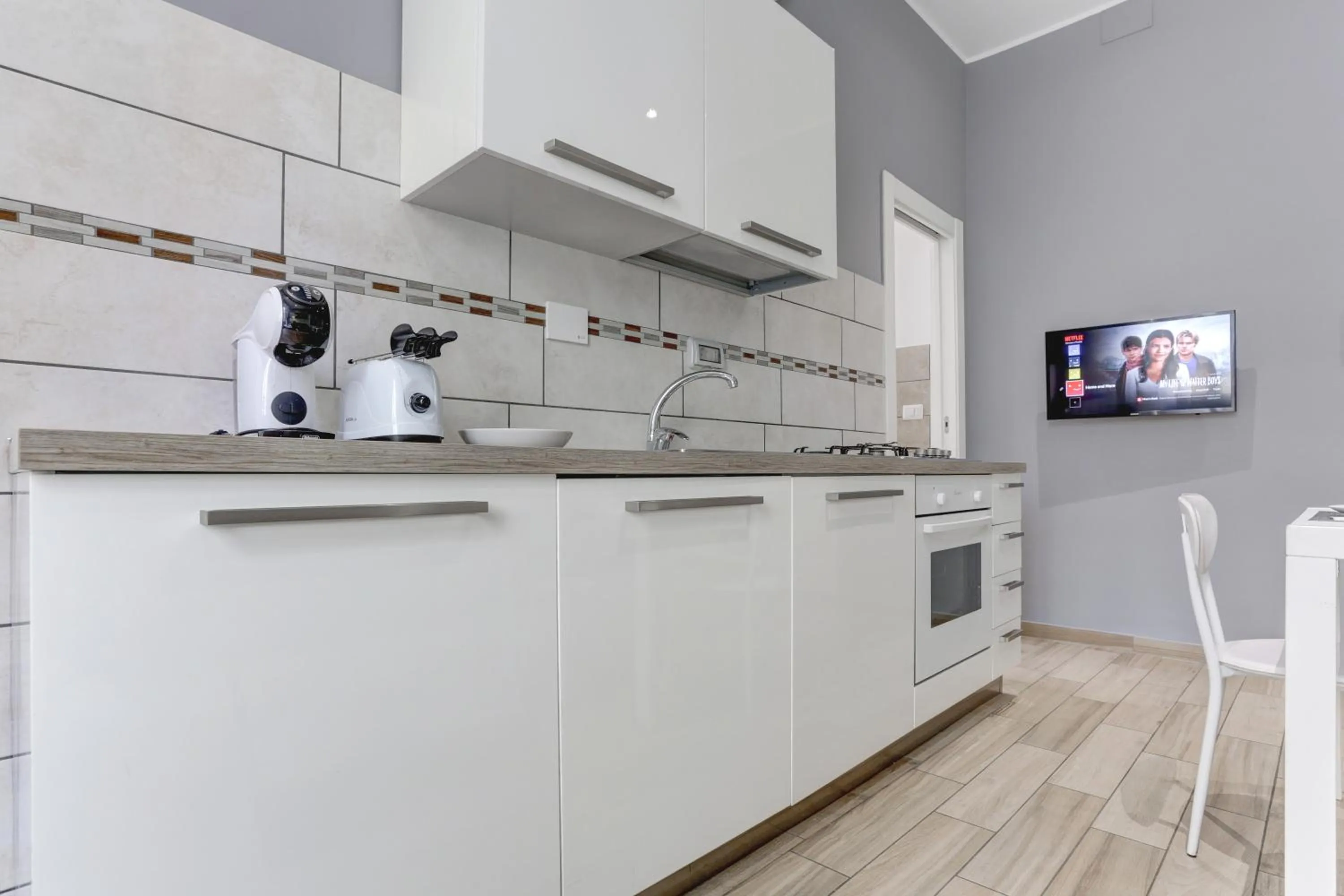 Kitchen or kitchenette in Appartamento Santi Quattro - Colosseo