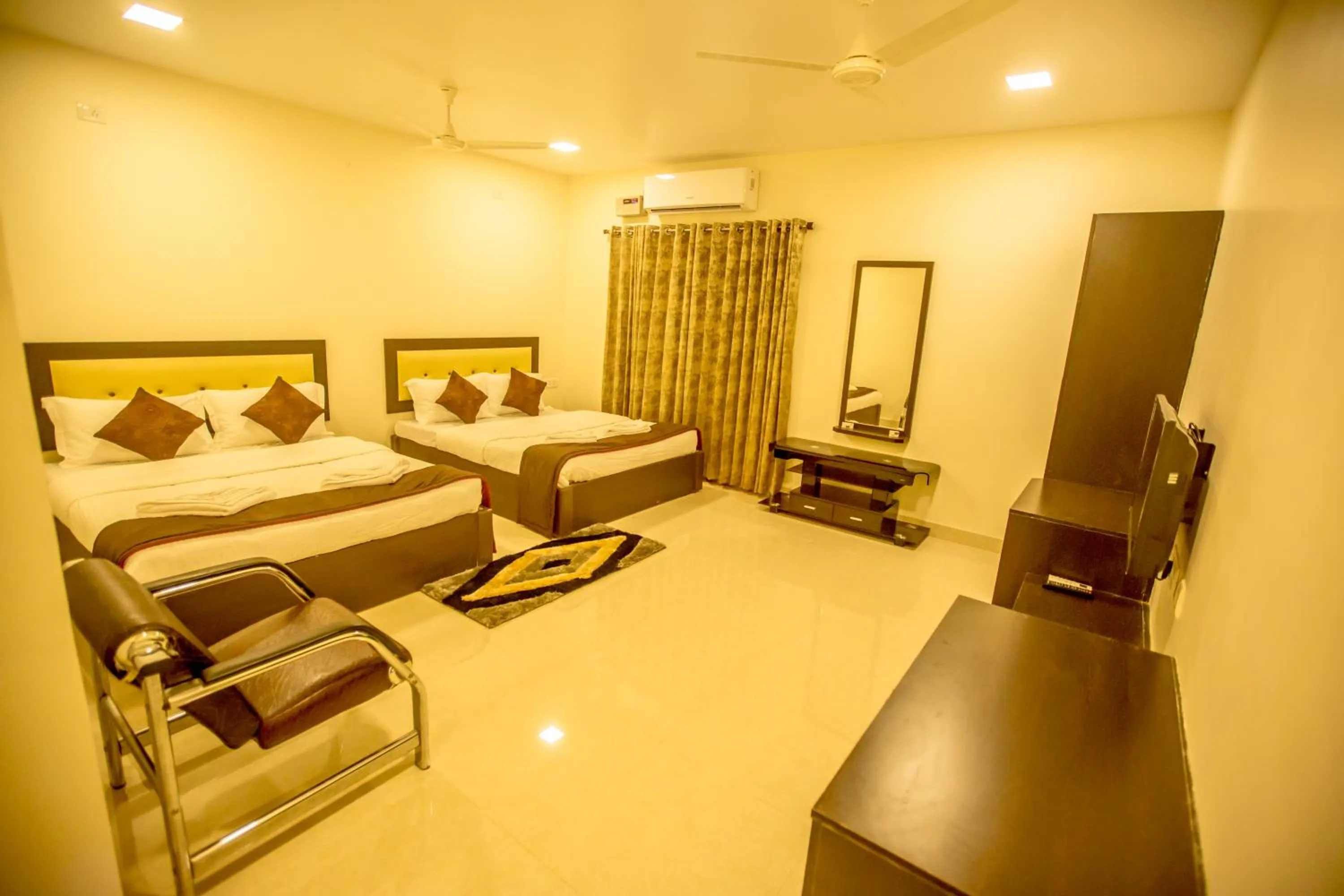 Photo of the whole room, Bed in Hotel Royal Elite Madurai