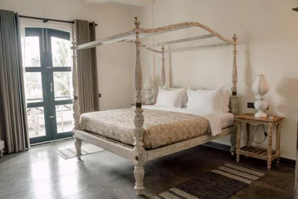 Bed in Naomi Beach Resort - Adults only