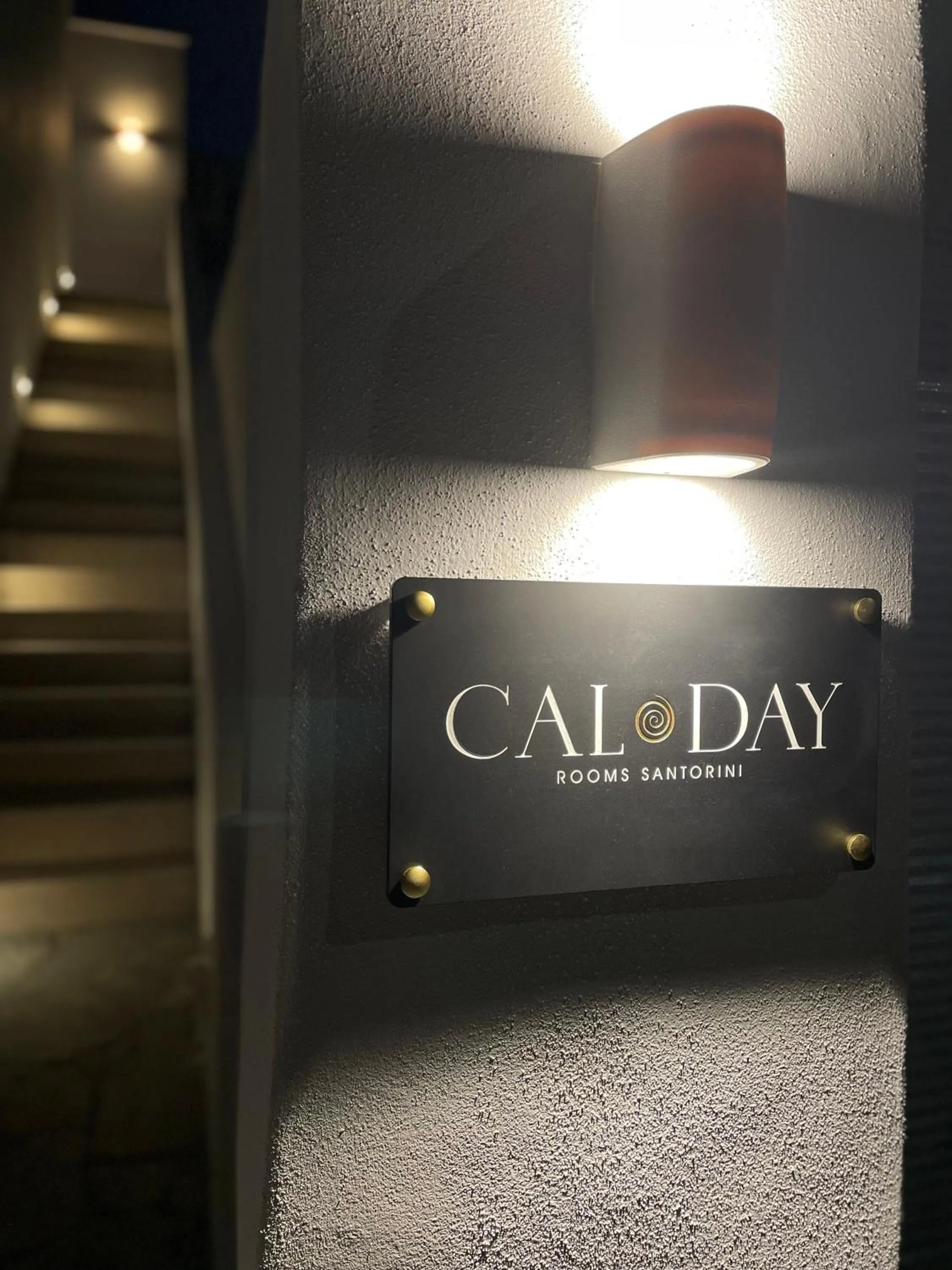 Property logo or sign in Cal Day Rooms Santorini