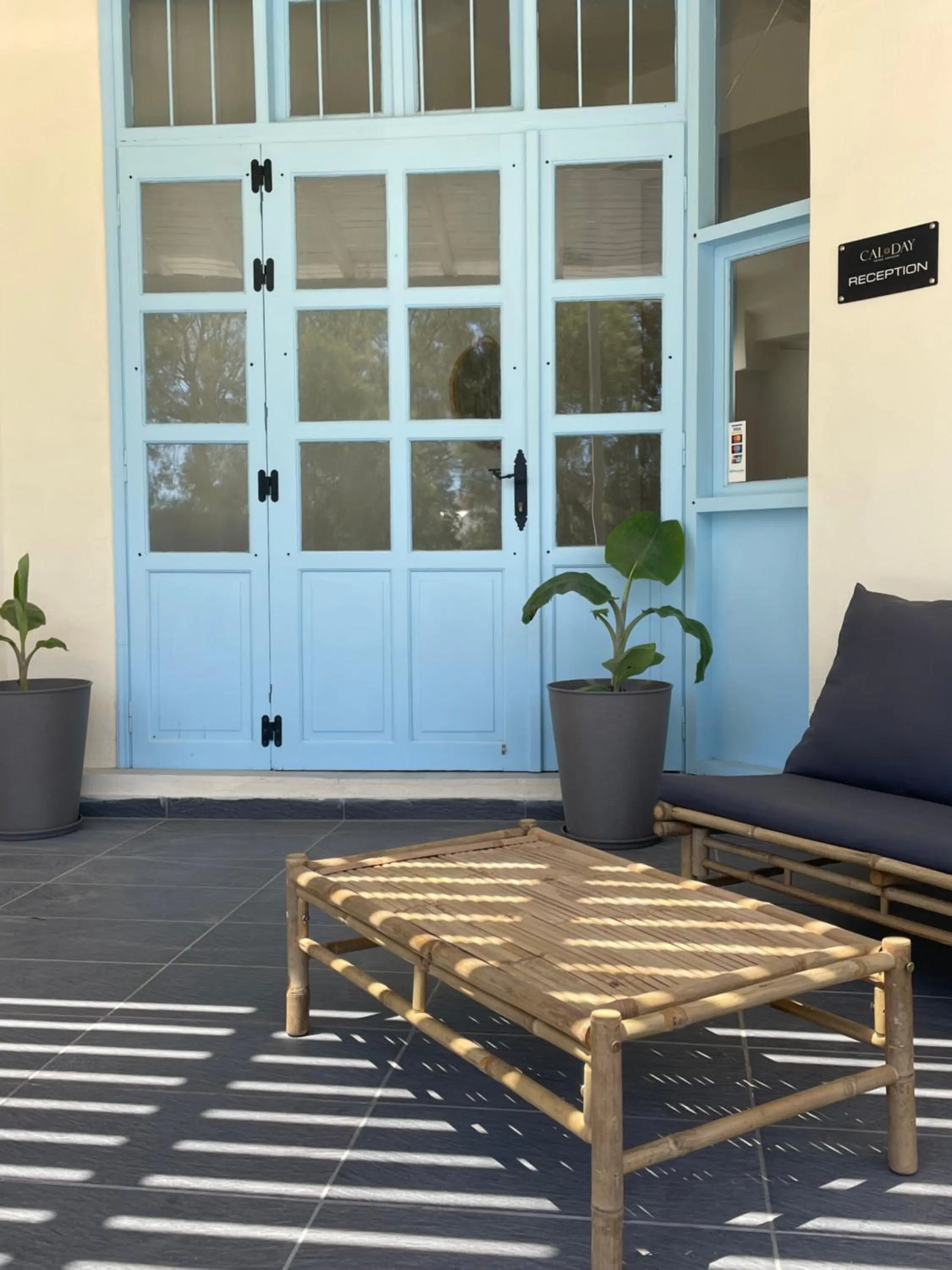 Communal lounge/ TV room in Cal Day Rooms Santorini