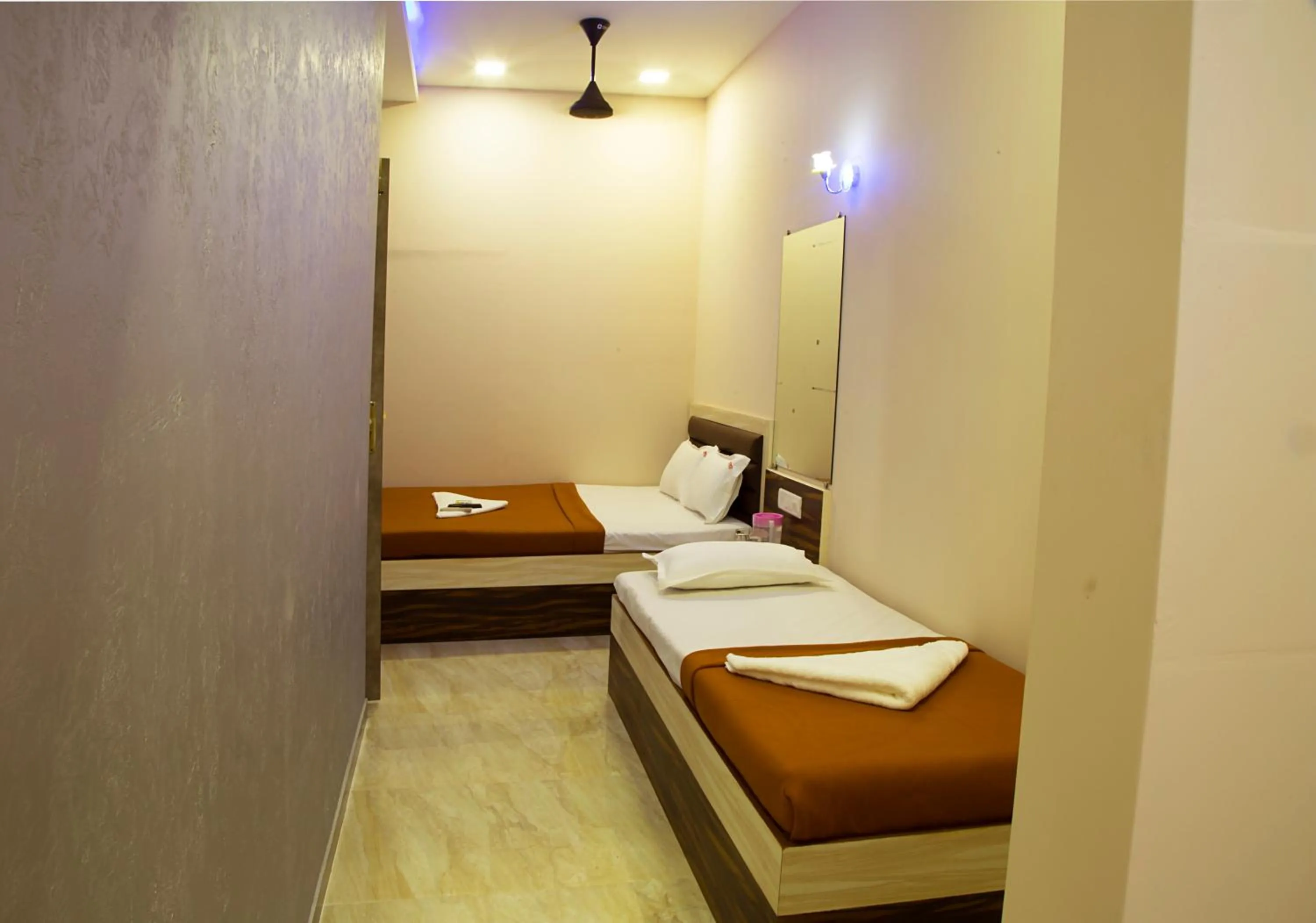 Photo of the whole room, Bed in Welcome Guest House