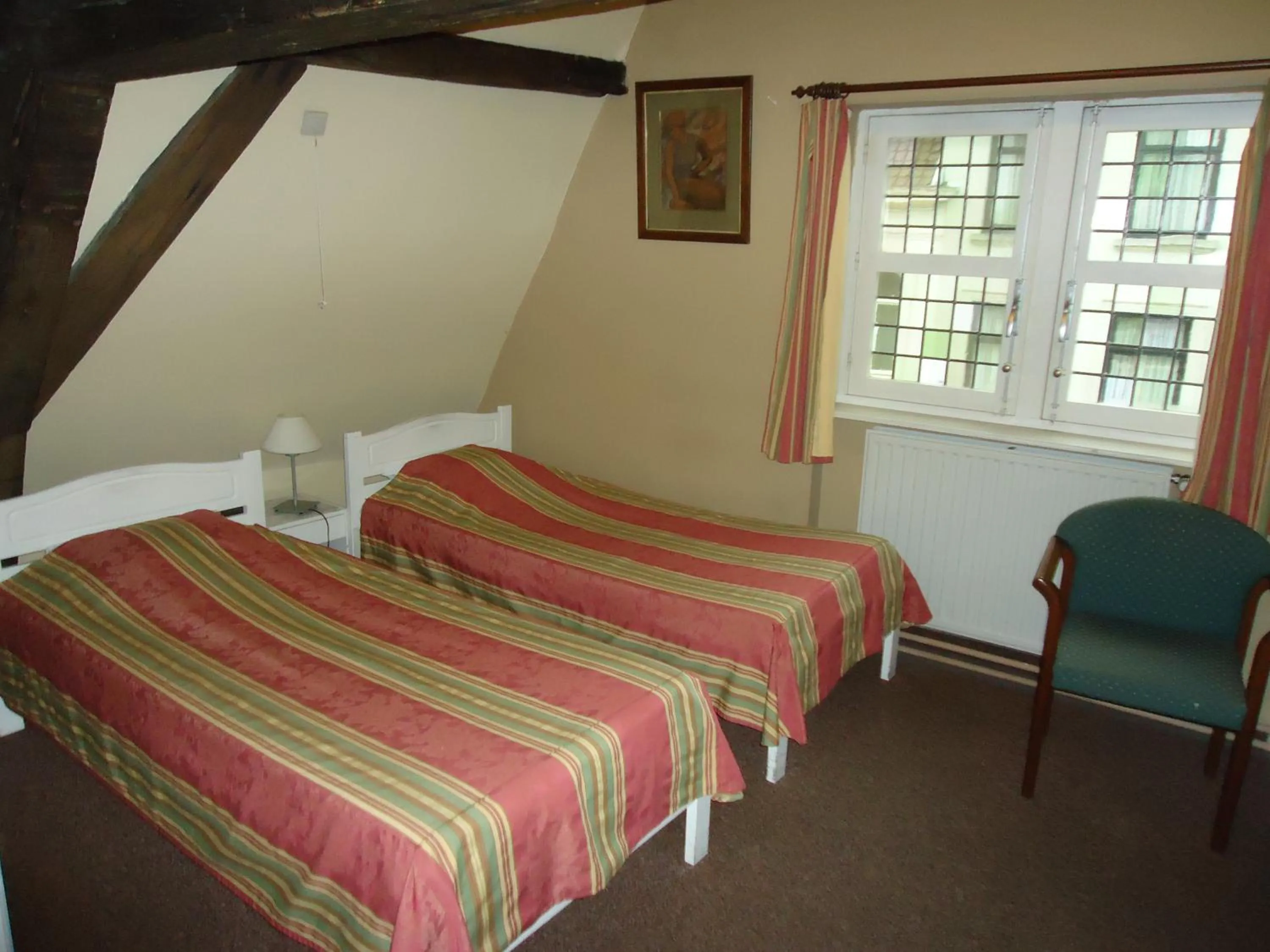 Bed in Erasmus Hotel