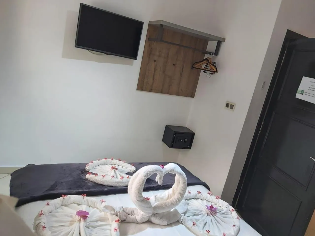 Bed in Appart Hotel Monaco