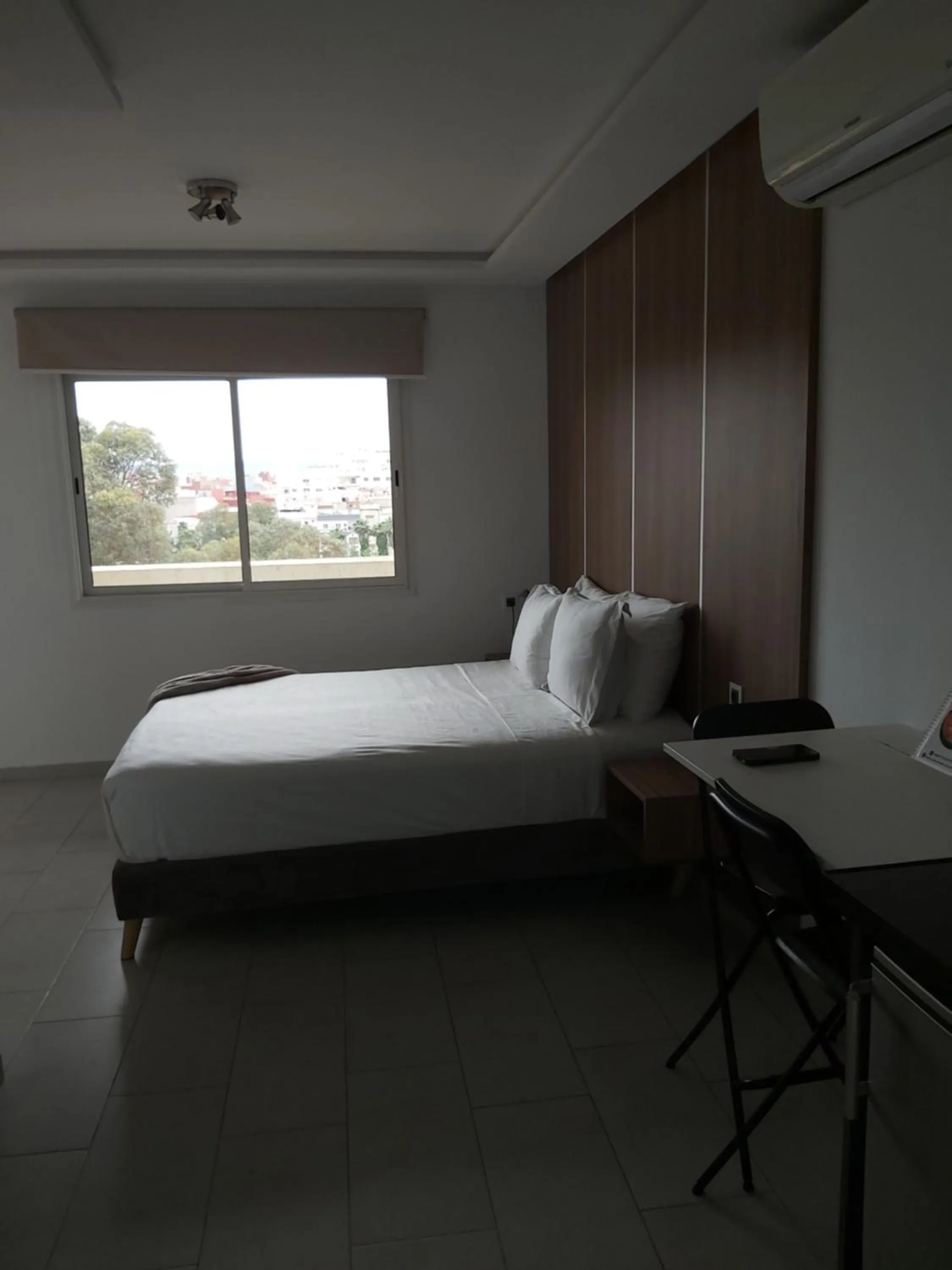 Bed in Appart Hotel Monaco