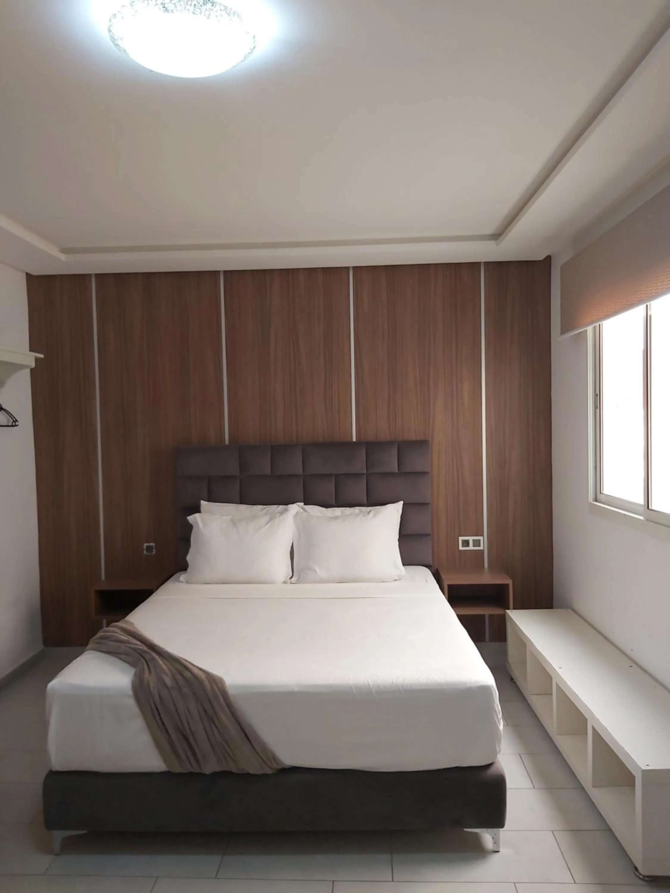 Bed in Appart Hotel Monaco